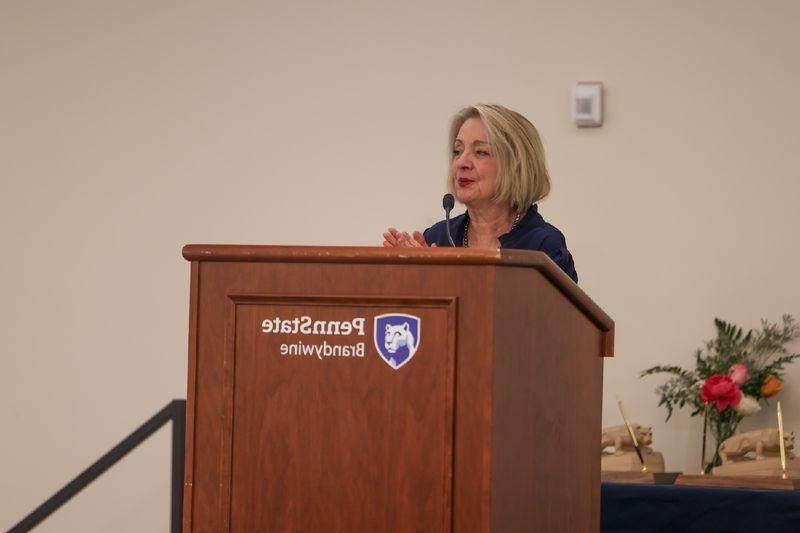 Dr. Wells speaking to a crowd